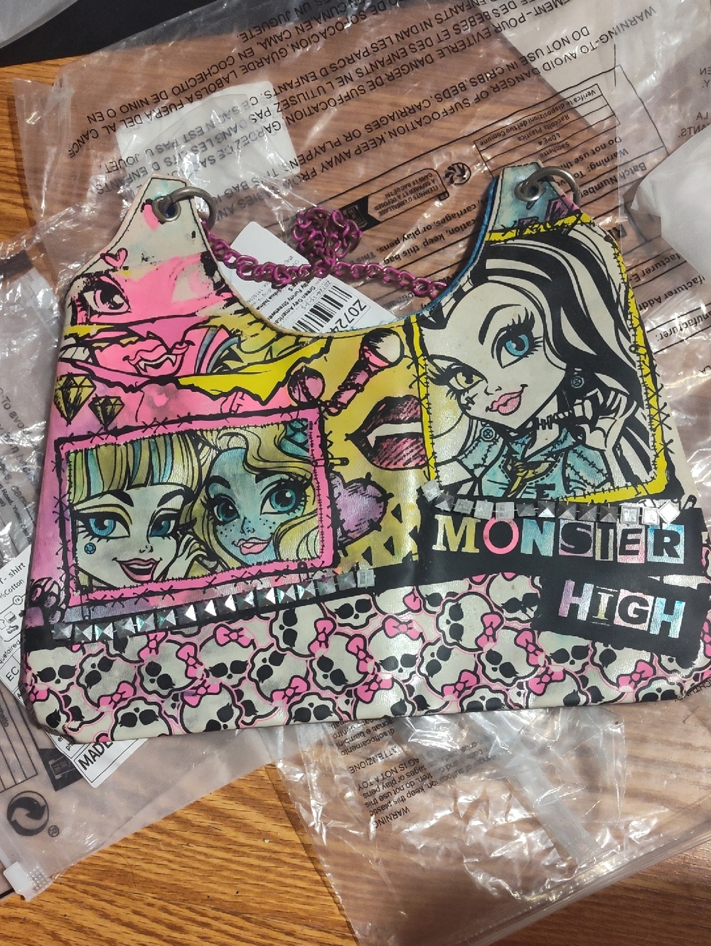monster high pink yellow and black kids shoulder bag with character art